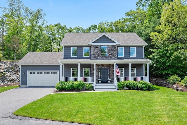 13 Vincent Way, Cumberland, RI 02864 - view of front of house with asphalt driveway, stone siding, a garage, a front yard, and covered porch