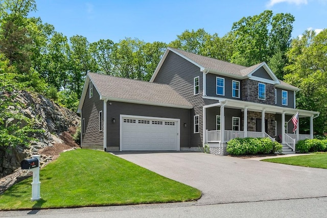 13 Vincent Way, Cumberland, RI 02864 - view of front of property featuring covered porch, an attached garage, driveway, a front yard, and stone siding