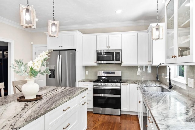 13 Vincent Way, Cumberland, RI 02864 - kitchen featuring stainless steel appliances, a sink, white cabinets, light stone counters, and crown molding