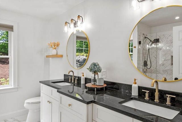 13 Vincent Way, Cumberland, RI 02864 - bathroom featuring healthy amount of natural light, double vanity, marble finish floors, and toilet