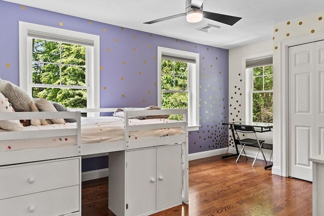 13 Vincent Way, Cumberland, RI 02864 - bedroom featuring wallpapered walls, multiple windows, wood finished floors, and baseboards