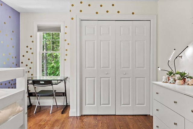 13 Vincent Way, Cumberland, RI 02864 - bedroom featuring a closet, wood finished floors, and wallpapered walls