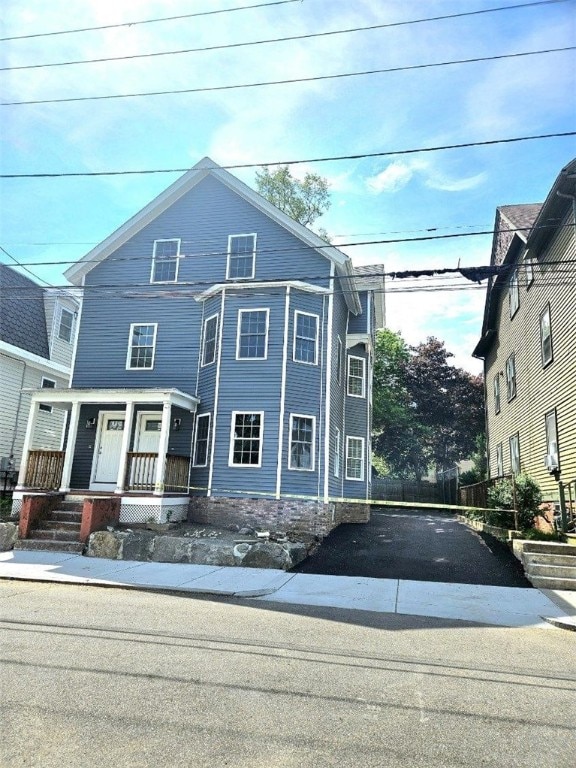 90 Grove St, Providence, RI 02903 - view of front facade featuring a porch
