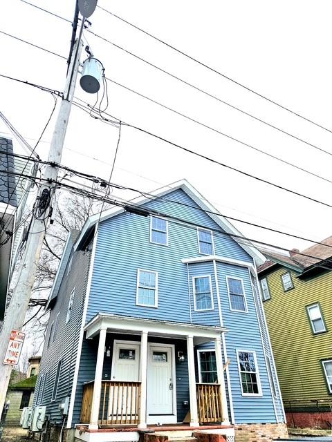 90 Grove St, Providence, RI 02903 - view of front of home featuring a porch