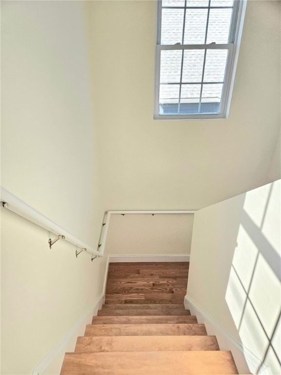90 Grove St, Providence, RI 02903 - stairs with baseboards and wood finished floors