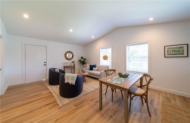 32 Exchange St Unit 104, East Greenwich, RI 02818 - living room with vaulted ceiling, light wood finished floors, recessed lighting, and baseboards