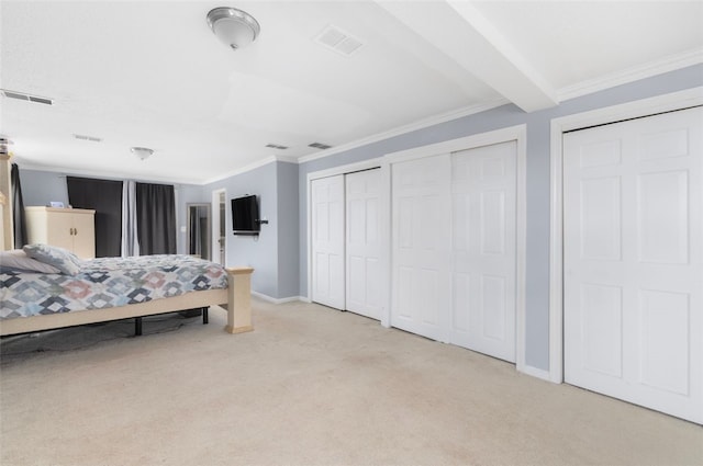 204 Reservoir Ave, Lincoln, RI 02865 - bedroom featuring light carpet, two closets, crown molding, and baseboards