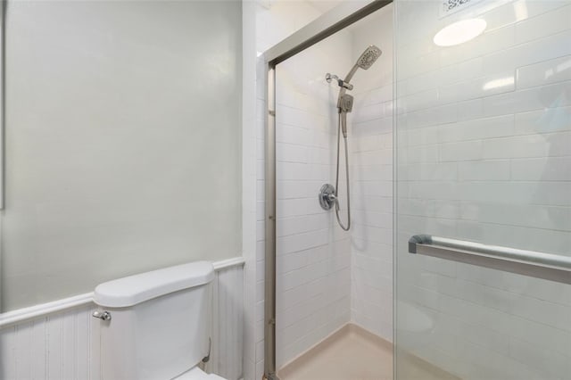 204 Reservoir Ave, Lincoln, RI 02865 - bathroom featuring a shower stall, toilet, and a wainscoted wall