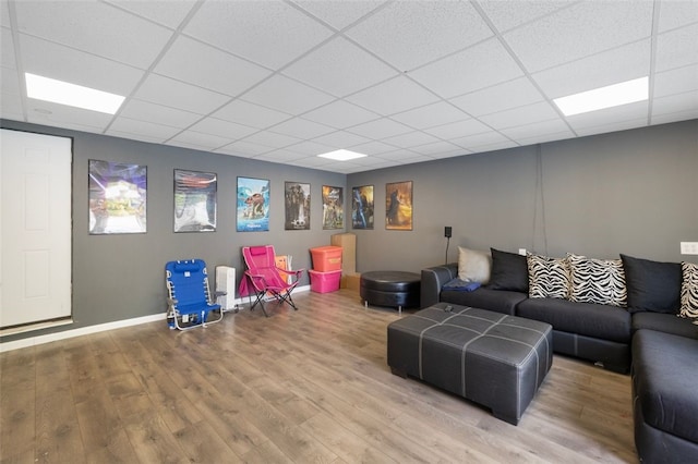 204 Reservoir Ave, Lincoln, RI 02865 - living room featuring a drop ceiling, wood finished floors, and baseboards