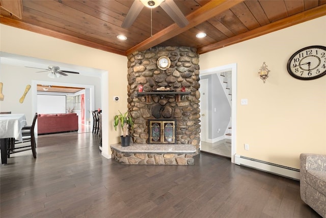204 Reservoir Ave, Lincoln, RI 02865 - living area with wood ceiling with exposed beams, ceiling fan, baseboard heating, wood finished floors, and stairs