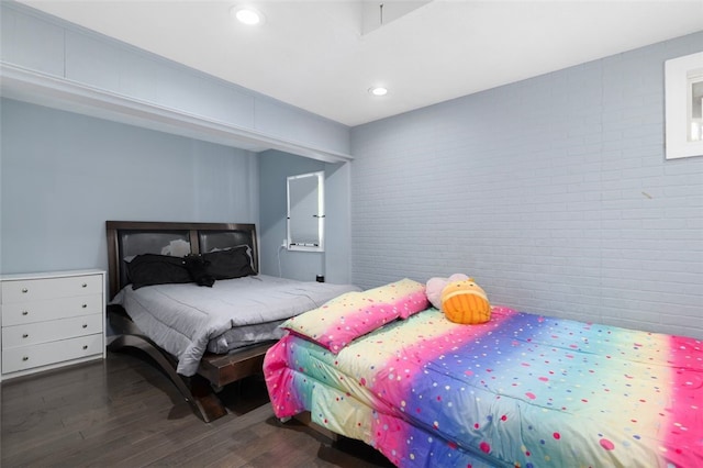 204 Reservoir Ave, Lincoln, RI 02865 - bedroom featuring brick wall, wood finished floors, and recessed lighting