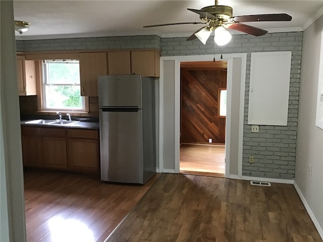 2073 Plainfield Pike, Johnston, RI 02919 - kitchen with freestanding refrigerator, a sink, ceiling fan, dark wood-style floors, and dark countertops