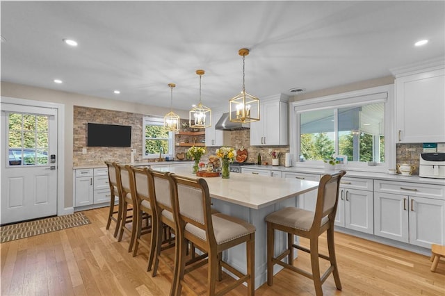 196 Stillwater Rd, Smithfield, RI 02917 - dining area with plenty of natural light, light wood-type flooring, recessed lighting, and a chandelier