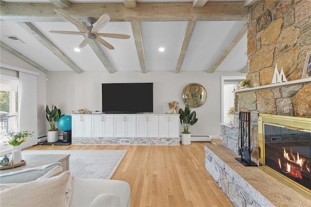 196 Stillwater Rd, Smithfield, RI 02917 - living room with baseboard heating, a stone fireplace, light wood-style floors, a ceiling fan, and recessed lighting