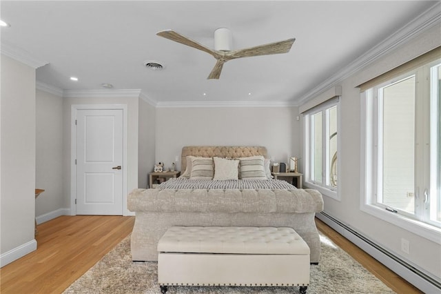 196 Stillwater Rd, Smithfield, RI 02917 - bedroom featuring a baseboard radiator, light wood-style floors, recessed lighting, crown molding, and baseboards