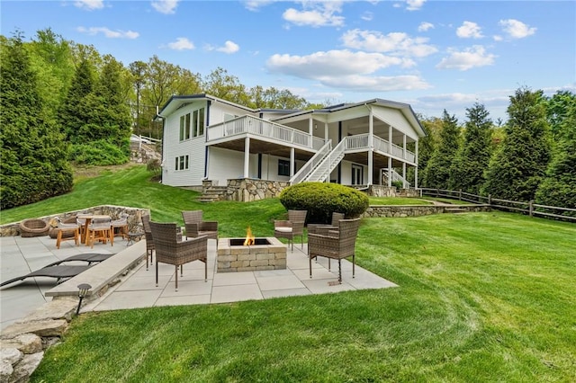 196 Stillwater Rd, Smithfield, RI 02917 - rear view of house with a fire pit, stairs, a patio area, and a wooden deck