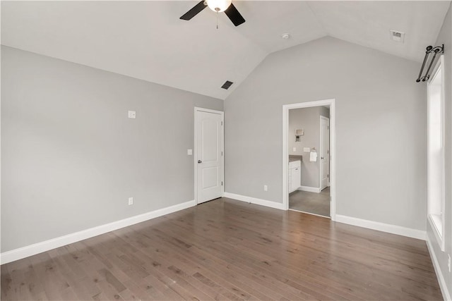 228 Morse Ave, Woonsocket, RI 02895 - unfurnished bedroom with vaulted ceiling, wood finished floors, baseboards, and a ceiling fan