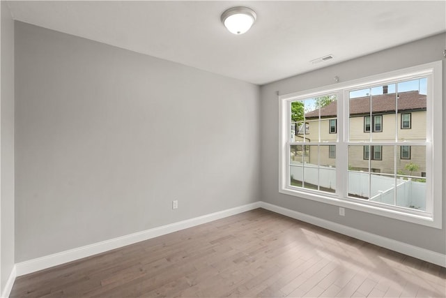 228 Morse Ave, Woonsocket, RI 02895 - empty room featuring baseboards and wood finished floors