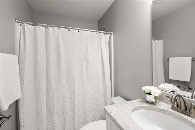 228 Morse Ave, Woonsocket, RI 02895 - bathroom with vanity, toilet, and curtained shower