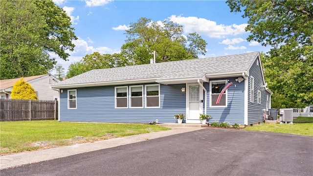 21 Meadowrue Trl, Narragansett, RI 02874 - view of front of house featuring a shingled roof and central air condition unit