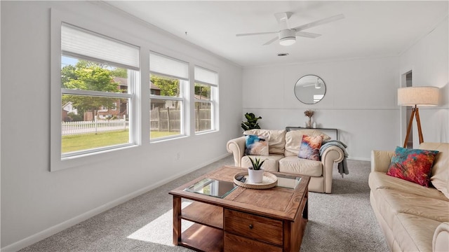 21 Meadowrue Trl, Narragansett, RI 02874 - living room featuring carpet floors, a ceiling fan, baseboards, and ornamental molding