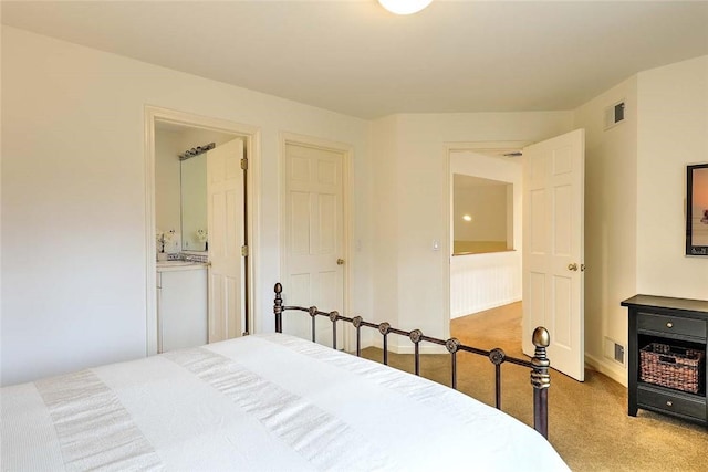 60 Pheasant Dr, East Greenwich, RI 02818 - bedroom featuring light carpet, ensuite bath, and baseboards
