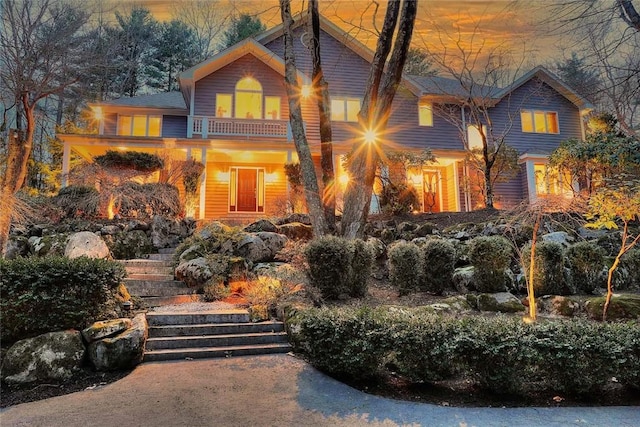 60 Pheasant Dr, East Greenwich, RI 02818 - rustic home featuring a balcony and stairs