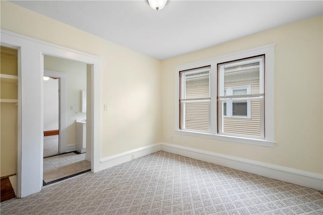 1362 Newport Ave, Pawtucket, RI 02861 - spare room featuring carpet flooring and baseboards
