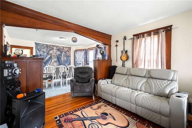 1362 Newport Ave, Pawtucket, RI 02861 - living area with healthy amount of natural light, wood finished floors, and beamed ceiling