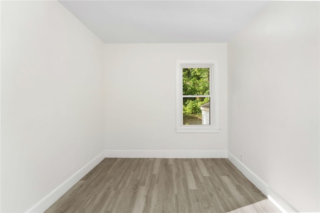 1875 Smith St, North Providence, RI 02911 - spare room featuring light wood finished floors and baseboards