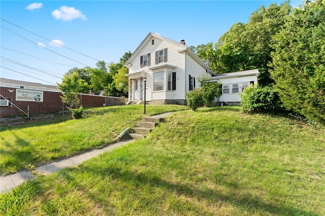 1875 Smith St, North Providence, RI 02911 - view of front of property with a chimney and a garage
