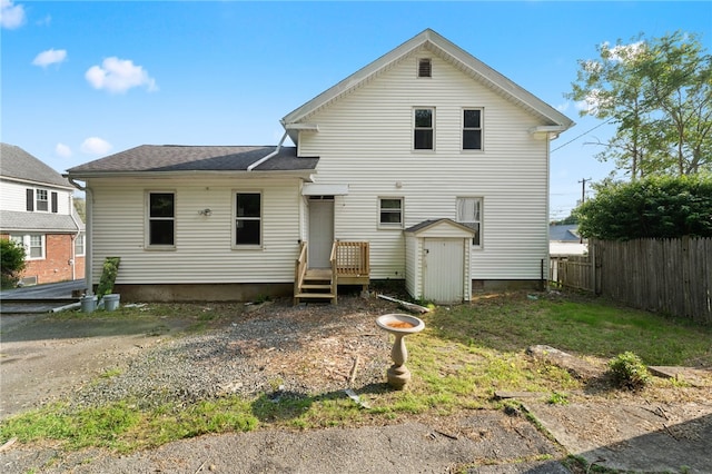 1875 Smith St, North Providence, RI 02911 - back of property with a shingled roof