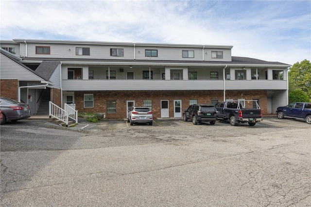 444 Woodward Rd Unit 23, North Providence, RI 02904 - view of front of property featuring uncovered parking and brick siding