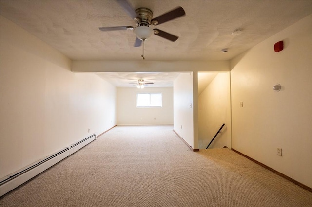 444 Woodward Rd Unit 23, North Providence, RI 02904 - spare room featuring baseboard heating, a ceiling fan, light colored carpet, and baseboards