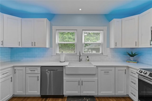 36 Ruth Ave, East Providence, RI 02916 - kitchen featuring stainless steel appliances, a sink, white cabinetry, light countertops, and recessed lighting
