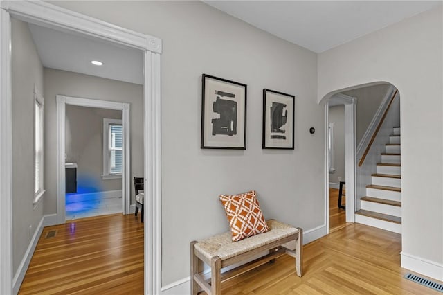 36 Ruth Ave, East Providence, RI 02916 - hall featuring baseboards, arched walkways, and stairway