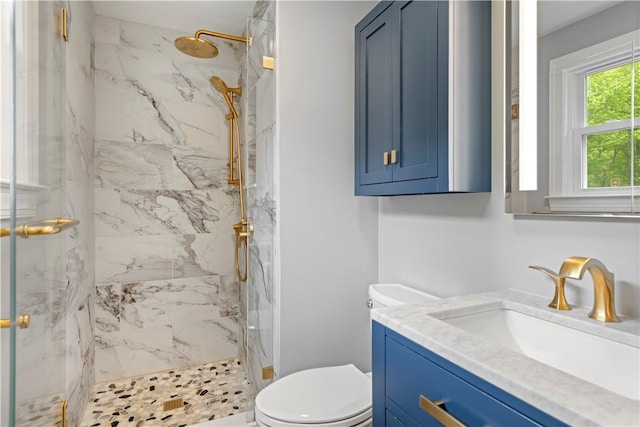 101 Huckleberry Rd, North Kingstown, RI 02852 - bathroom featuring toilet, vanity, and a marble finish shower
