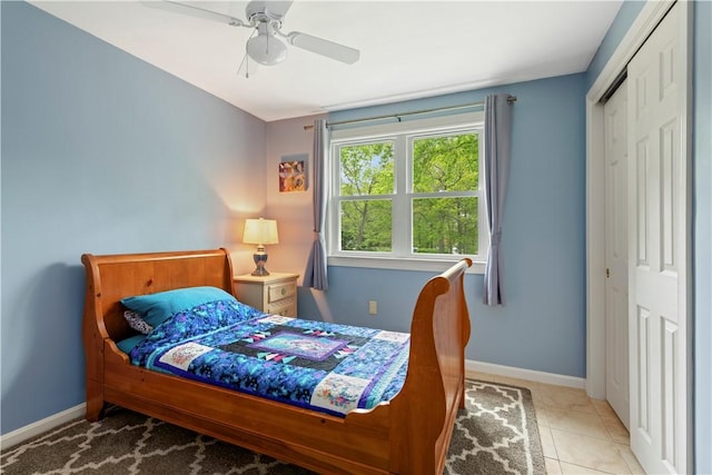 101 Huckleberry Rd, North Kingstown, RI 02852 - tiled bedroom with a closet, baseboards, and a ceiling fan