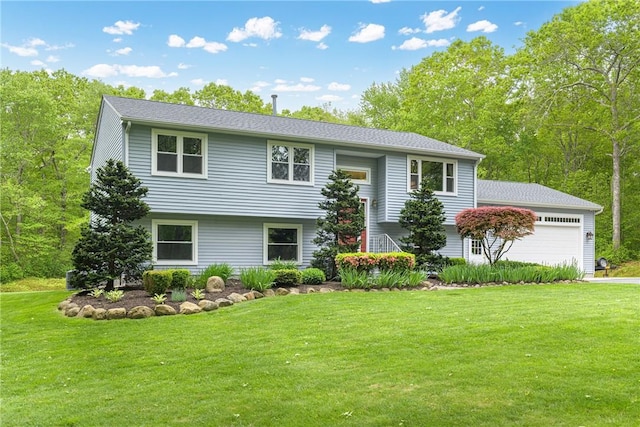 101 Huckleberry Rd, North Kingstown, RI 02852 - bi-level home with a front lawn and an attached garage