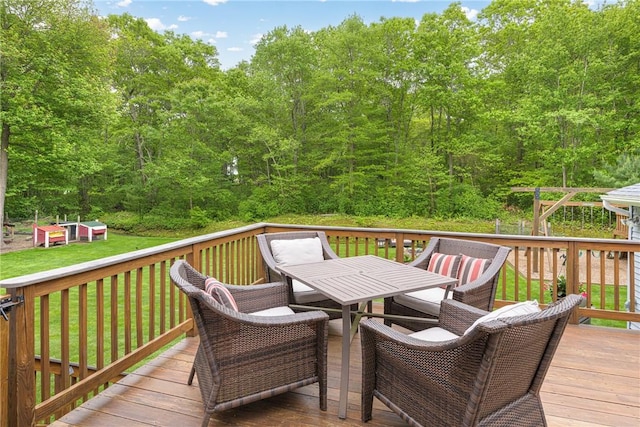 101 Huckleberry Rd, North Kingstown, RI 02852 - wooden deck featuring outdoor dining space and a yard