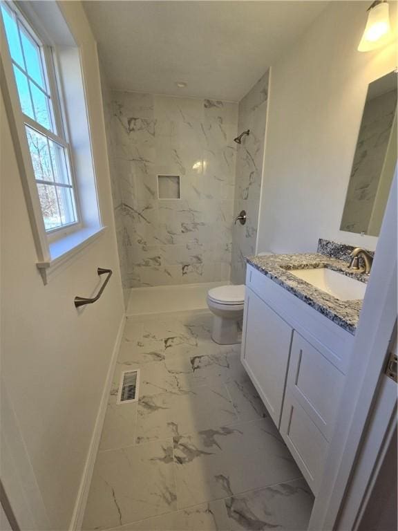 10 Sheffield Rd, Smithfield, RI 02828 - bathroom with vanity, marble look tile flooring, and a marble finish shower