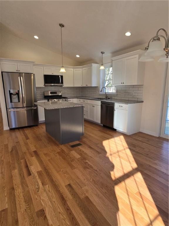 10 Sheffield Rd, Smithfield, RI 02828 - kitchen featuring stainless steel appliances, white cabinetry, backsplash, pendant lighting, and dark wood-style flooring