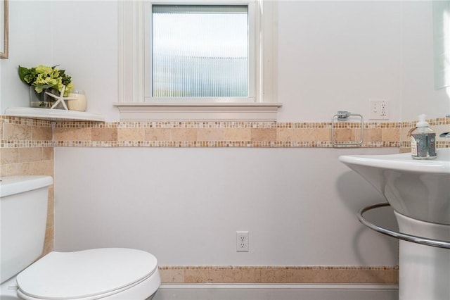 85 Frigate St, Jamestown, RI 02832 - half bathroom featuring toilet and tile walls