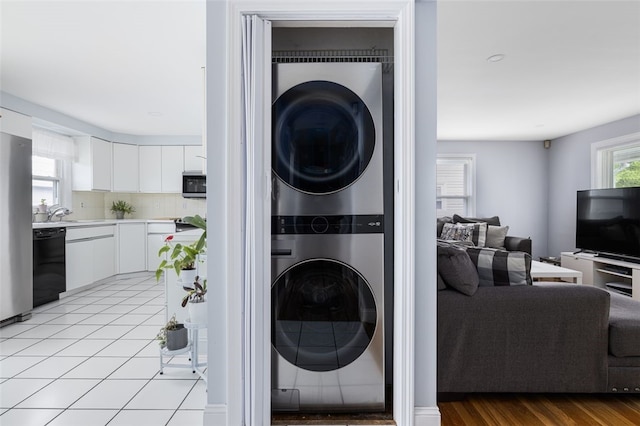 150 Memorial Dr, Pawtucket, RI 02860 - washroom with stacked washing machine and dryer