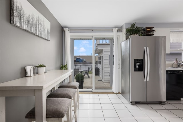150 Memorial Dr, Pawtucket, RI 02860 - kitchen featuring stainless steel refrigerator with ice dispenser and black dishwasher
