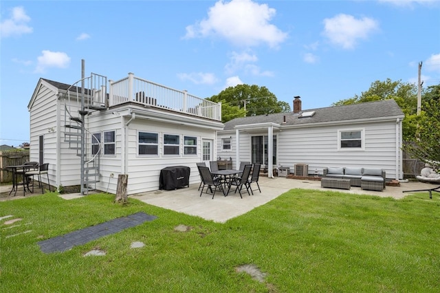 150 Memorial Dr, Pawtucket, RI 02860 - rear view of house with a balcony, an outdoor living space, a yard, a patio area, and a chimney