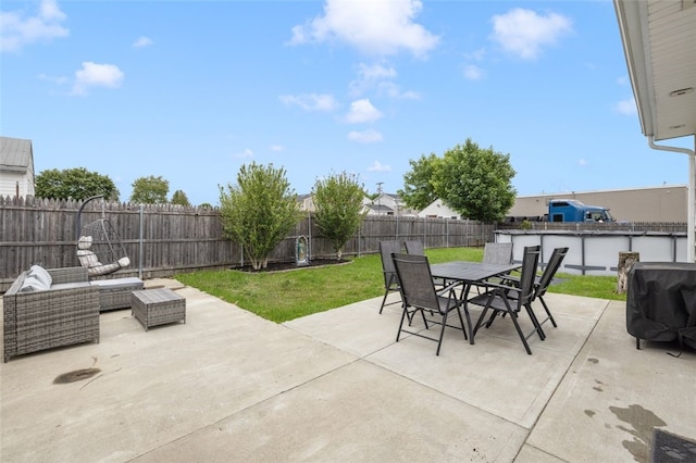 150 Memorial Dr, Pawtucket, RI 02860 - fenced backyard with outdoor dining area and a patio