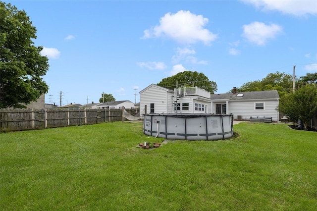 150 Memorial Dr, Pawtucket, RI 02860 - rear view of property featuring a chimney