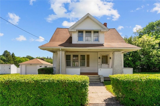 8 Tampa St, West Warwick, RI 02893 - bungalow-style house with covered porch, a garage, and a chimney