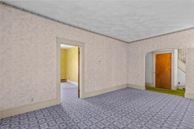 8 Tampa St, West Warwick, RI 02893 - carpeted empty room featuring arched walkways